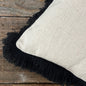 fringed cushion