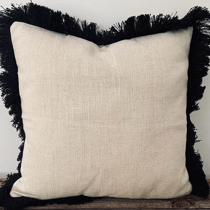 fringed cushion